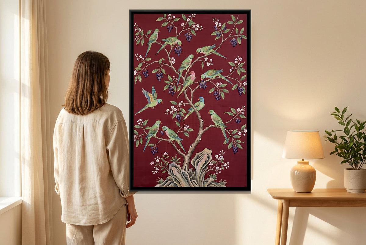 Parakeets in a Jamun Tree on Oxblood Silk - canvas art shown in a styled room