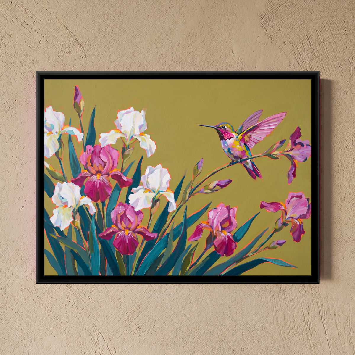 Perched Hummingbird and Irises - framed canvas art hung on a wall