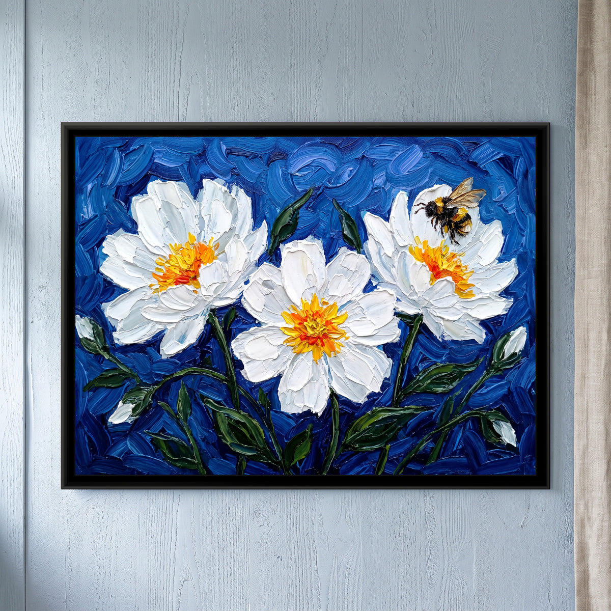 White Blossoms in Cobalt - framed canvas art hung on a wall